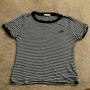Brand from Occasion and it is black and white and it have a little dinosaur!!!!!